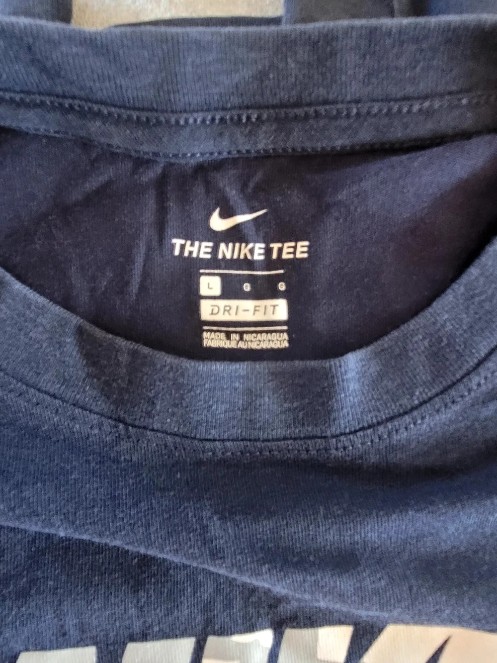 Nike Navy Short Sleeve Dri-FIT Tee with White Swoosh